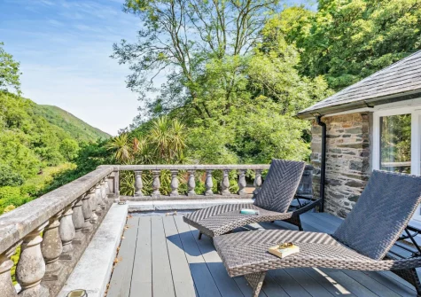 Bedroom #1 roof terrace, complete with sun loungers, at The Barton, Martinhoe