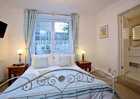 The bedroom at The Beacon at Harbour Lights, Brixham
