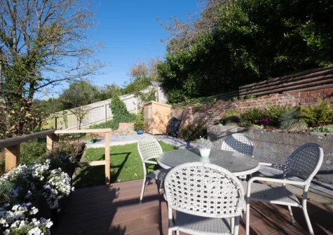 The shared patio, alfresco dining area & garden at The Belvedere, Beer