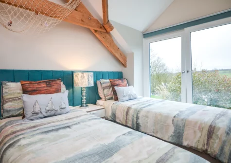 Bedroom #4, made up as two singles, at The Big Barn at Well Cottage, Jacobstow