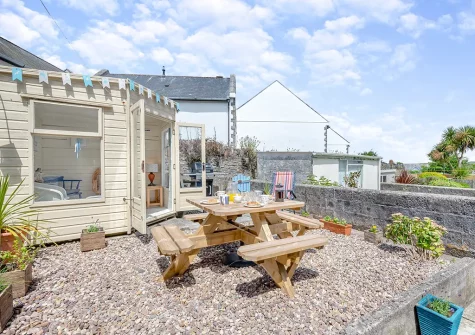The enclosed patio, alfresco dining area & summer house at The Blue House, 18 Glynn Road, Padstow