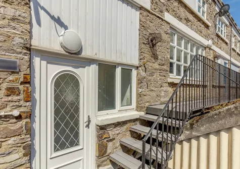 Stairs up to the terrace & alfresco dining area at The Boat Yard, Brixham
