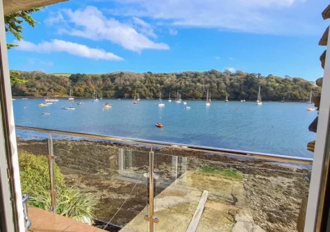 The river view from the living area & balcony at The Boathouse, St Mawes