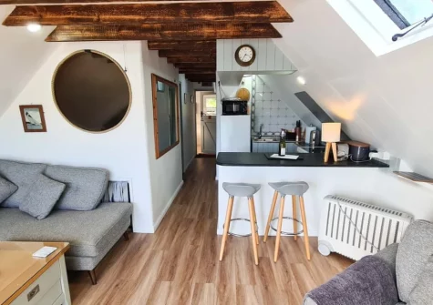 The living area & kitchen at The Boathouse, St Mawes