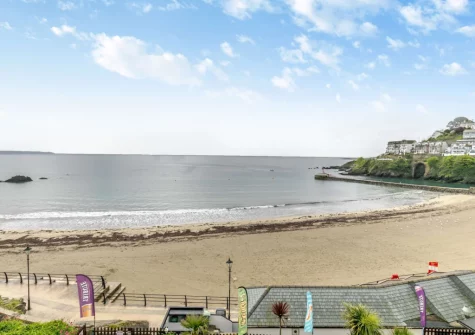 The beach & sea view from the balcony & outdoor sitting area at The Bolt Hole at Admiralty Court, Looe