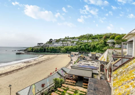 The beach & sea view from the balcony & outdoor sitting area at The Bolt Hole at Admiralty Court, Looe