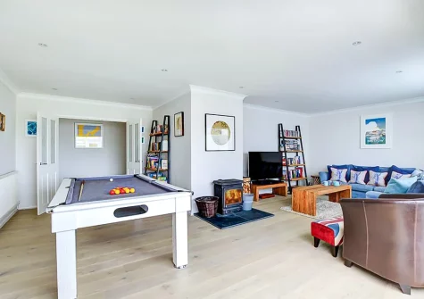 The living room with pool table at The Bower, Trevone