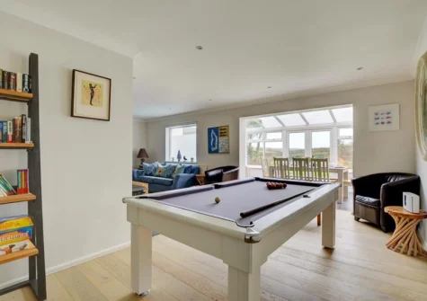 The living room with pool table at The Bower, Trevone