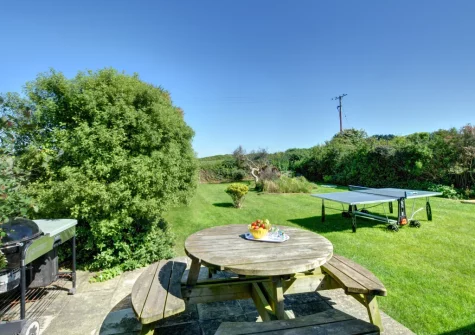 The patio, barbecue, alfresco dining area & garden at The Bower, Trevone