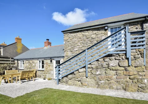 The patio & alfresco dining area at The Byre, Sennen