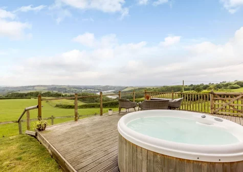 The decked patio & hot tub at The Cabin, Bideford