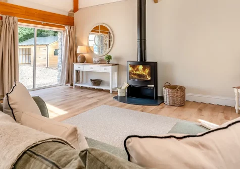 The Cart House, Burnthouse is a stylish barn conversion offering rustic charm with modern luxury. Enjoy vaulted ceilings, marble kitchen worktops, wood burner, and private terrace perfect for al fresco dining in beautiful rural Cornwall.