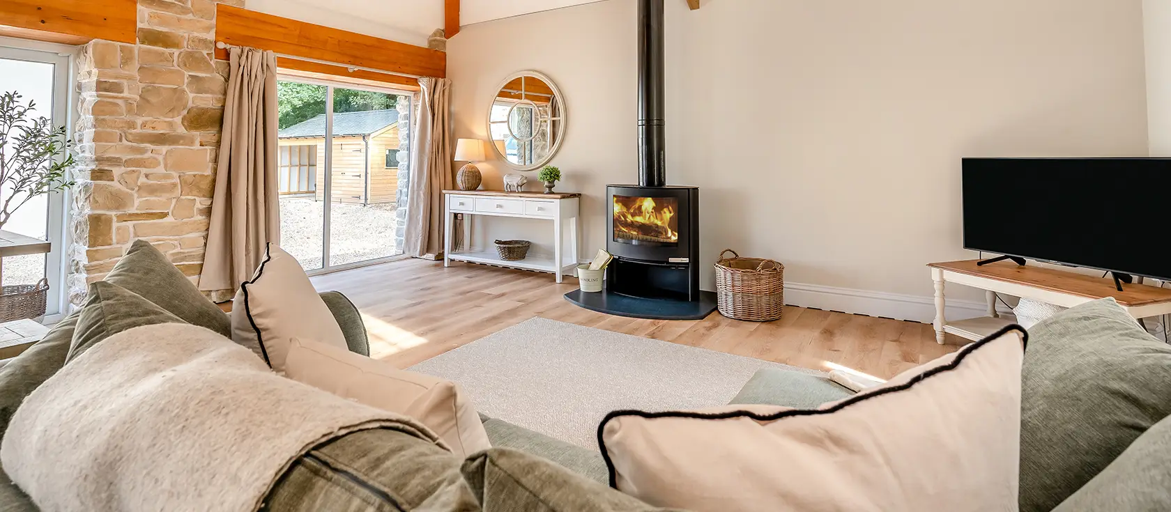 The Cart House, Burnthouse is a stylish barn conversion offering rustic charm with modern luxury. Enjoy vaulted ceilings, marble kitchen worktops, wood burner, and private terrace perfect for al fresco dining in beautiful rural Cornwall.