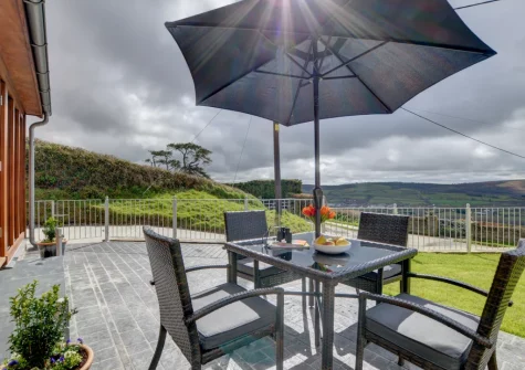 The patio, alfresco dining area & enclosed garden at The Cart Linhay, Landkey