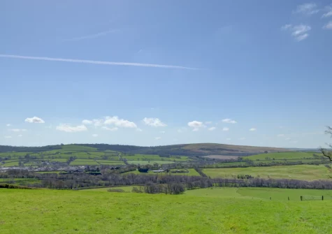 The far-reaching countryside view from the patio & alfresco dining area at The Cart Linhay, Landkey