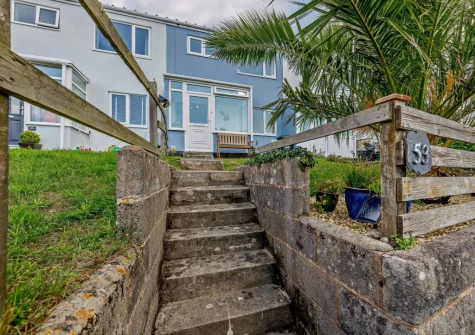 The front garden & outdoor sitting area at The Chimes, Brixham