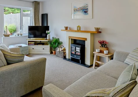 The Chimes, Brixham is a charming 3-bedroom house with enclosed garden, moments from the harbour. Enjoy coastal walks, local beaches, dog-friendly stays, and easy access to the English Riviera's finest attractions for unforgettable seaside holidays.