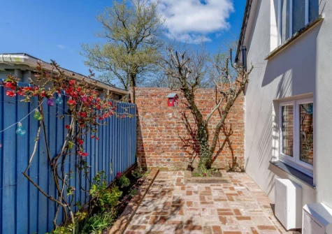 The enclosed courtyard garden at The Coach House at Kilbroney, Week St Mary