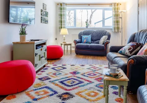 The Coach House at Kilbroney is a stunning converted home near Bude, featuring luxurious bedrooms, an enclosed garden, and countryside charm. Perfect for families seeking relaxation with easy access to North Cornwall's beaches and attractions.