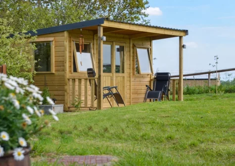 The dog friendly enclosed garden & summer house at The Coach House, Whiddon Down