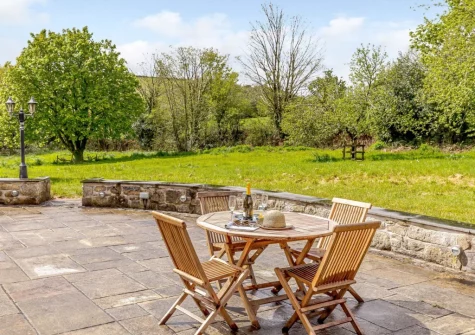The patio, alfresco dining area & garden at The Corn Mill, Coombe