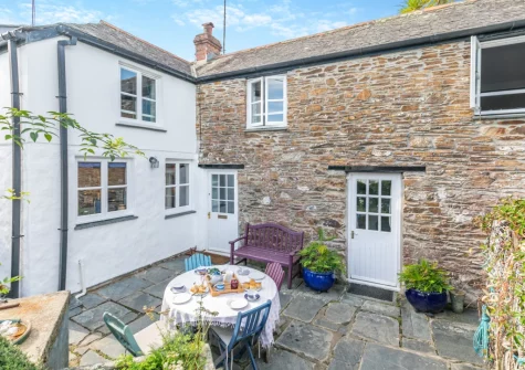 The patio, barbecue & alfresco dining area at The Cottage, Helford