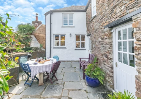 The patio, barbecue & alfresco dining area at The Cottage, Helford