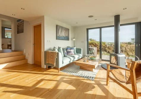 The living area at The Deck House, Morcliff, Goonvrea