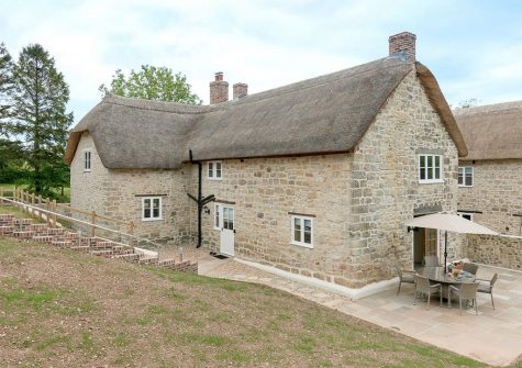 The patio at The Farmhouse at Higher Westwater Farm, Westwater