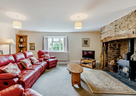 The living room at The Farmhouse, Spirewell Farm, Wembury