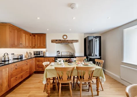 The farmhouse-style kitchen at The Farmhouse, Spirewell Farm, Wembury