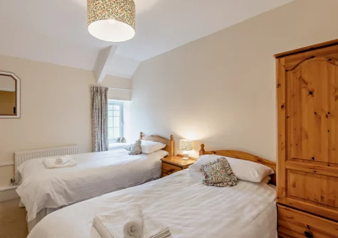 Bedroom #4 at The Farmhouse, Spirewell Farm, Wembury