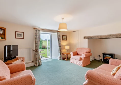The sun room at The Farmhouse, Spirewell Farm, Wembury