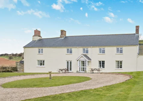 The Farmhouse has lots of space including a reading room, sunroom and children's playroom