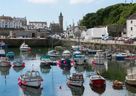 Porthleven's harbour is the focal point of the town where you'll find many of its shops, cafes & restaurants