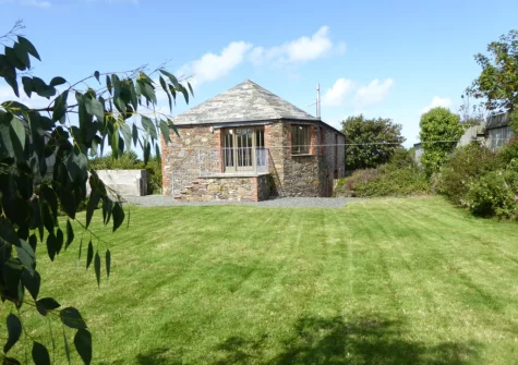The enclosed side garden at The Grain Store, Crackington Haven