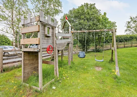 The shared children's play area at The Granary, Bittadon