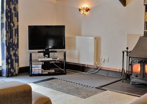 The Granary, Egloskerry is a beautifully converted, 16th century granary with open plan living, woodburner, beams, games room, two bedrooms and two bathrooms. It has a private terrace and ten-acre gardens in scenic countryside near Launceston.