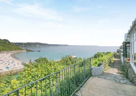 The beach & sea view from the terrace & outdoor sitting area at The Gulls, Looe