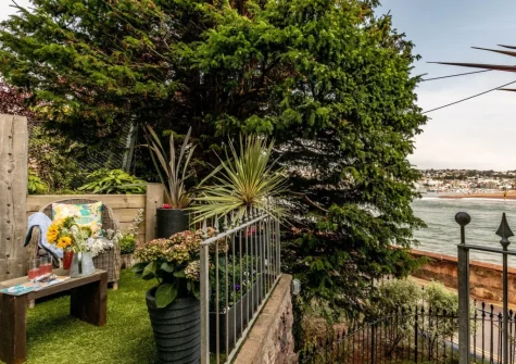 The enclosed private garden & outdoor sitting area at The Gun House, Shaldon