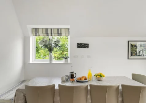 The dining area at The Hawthorns at Roserrow, Polzeath