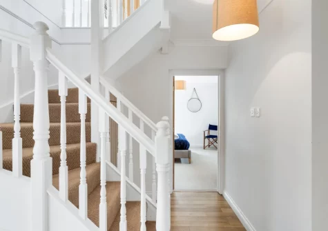 The hallway & stairs up to the first floor at The Hawthorns at Roserrow, Polzeath