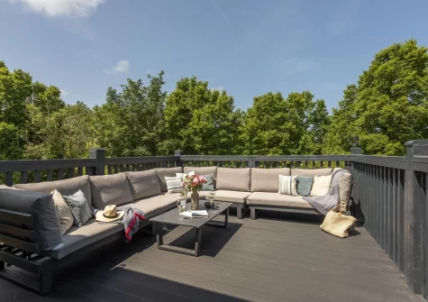 The large decked terrace & outdoor sitting area at The Hawthorns at Roserrow, Polzeath