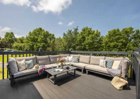 The large decked terrace & outdoor sitting area at The Hawthorns at Roserrow, Polzeath