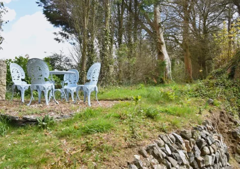 The garden terrace & alfresco dining area at The Hayloft at Hembal Manor, St Austell