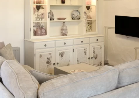 The Hayloft at Hembal Manor, St Austell is a characterful loft-style apartment with beamed vaulted ceilings, set in peaceful grounds with woodland walks, a private raised terrace, and easy access to Cornwall's stunning south coast beaches.
