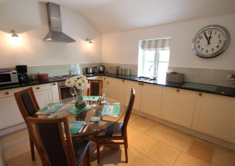 The kitchen & dining area at The Hayloft, Oare