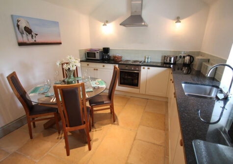 The kitchen & dining area at The Hayloft, Oare