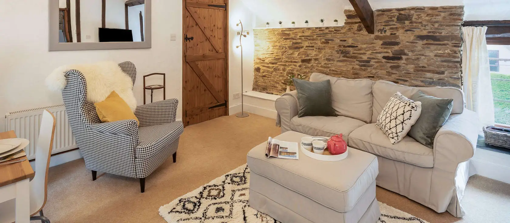 The Hayloft On Dartmoor, Yelverton is a characterful barn conversion blending rustic charm with modern comfort. Featuring exposed beams, original stonework, and a peaceful garden, it offers the perfect base for exploring Dartmoor's wild beauty.