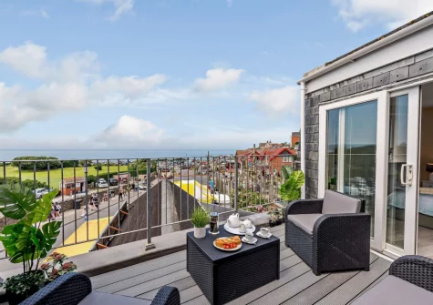 The decked balcony & outdoor sitting area at The Horseshoe, Woolacombe